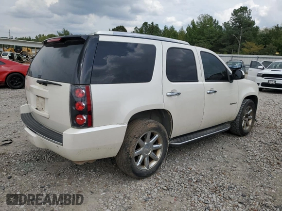 2011 GMC Yukon Denali with VIN 1GKS1EEFXBR313625, listed as a Copart auction lot 72634294 with 129,834 mi miles and Salvage Title. Bid and sale history available at carsss.com. Image 3.