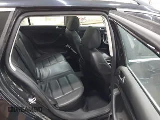 2014 Volkswagen Jetta SportWagen TDI w/Sunroof & Nav with VIN 3VWPL7AJ2EM626110, listed as a IAAI auction lot 42093622 with 115,691 mi miles. Bid and sale history available at carsss.com. Image 7.