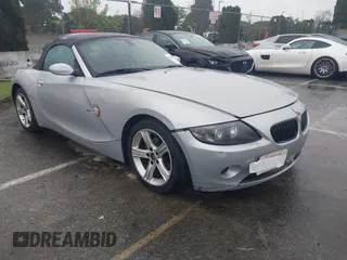 2004 BMW Z4 2.5i with VIN 4USBT33554LS49871, listed as a IAAI auction lot 41570696 with 128,622 mi miles. Bid and sale history available at carsss.com. Image 1.