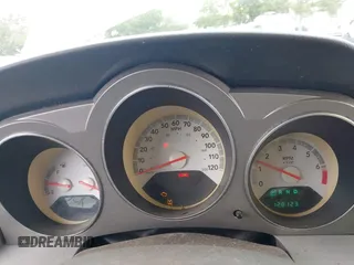 2008 Dodge Avenger SXT with VIN 1B3LC56K98N213958, listed as a IAAI auction lot 41829798 with 128,123 mi miles. Bid and sale history available at carsss.com. Image 7.