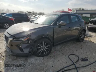 2018 Mazda CX-3 Touring z VIN JM1DKDC79J0311181, wystawiony jako Copart lot #54307795 z przebiegiem 141 348 mil mil oraz Czysty tytuł • Clean title. Historia ofert i sprzedaży dostępna na DreamBid. Obrazek 1.