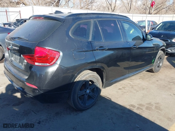 2014 BMW X1 xDrive28i with VIN WBAVL1C58EVY11143, listed as a IAAI auction lot 41396236 with 115,667 mi miles. Bid and sale history available at carsss.com. Image 4.