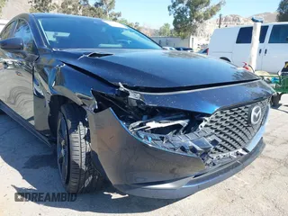 2021 Mazda 3 S with VIN JM1BPAALXM1326956, listed as a IAAI auction lot 42304248 with 55,104 mi miles and . Bid and sale history available at DreamBid. Image 18.