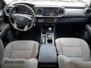2018 Toyota Tacoma SR5 с VIN 5TFAZ5CN3JX071474, выставлен на аукционе Copart как лот 54677335 с пробегом 86 866 миль миль и Списание • Salvage title. История ставок и продаж доступна на DreamBid. Изображение 8.