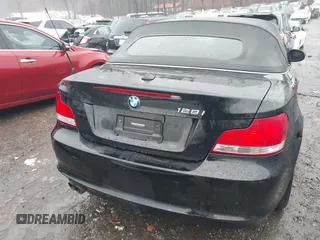 2011 BMW 1 Series 128i with VIN WBAUL7C52BVM79176, listed as a IAAI auction lot 41387249 with 99,145 mi miles and . Bid and sale history available at carsss.com. Image 17.
