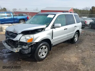 2005 Honda Pilot EX-L with NAVI with VIN 2HKYF18725H534538, listed as a IAAI auction lot 41677322 with 157,987 mi miles. Bid and sale history available at carsss.com. Image 2.