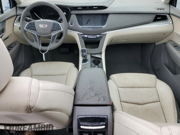 2018 Cadillac XT5 Premium Luxury FWD z VIN 1GYKNERS5JZ127703, wystawiony jako Copart lot #58315215 z przebiegiem Nie podano mil oraz Szkoda całkowita • Salvage title. Historia ofert i sprzedaży dostępna na DreamBid. Obrazek 8.