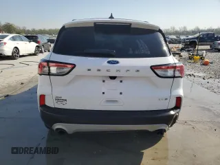 2020 Ford Escape SE z VIN 1FMCU9G63LUA01099, wystawiony jako Copart lot #52207345 z przebiegiem 73 321 mil mil oraz Szkoda całkowita • Salvage title. Historia ofert i sprzedaży dostępna na DreamBid. Obrazek 6.