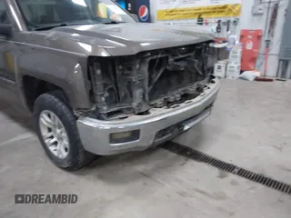 2014 Chevrolet Silverado 1500 LT with VIN 1GCVKREC9EZ240612, listed as a IAAI auction lot 41108566 with 200,625 mi miles and . Bid and sale history available at DreamBid. Image 6.
