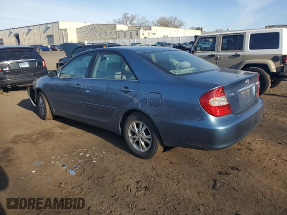 2004 Toyota Camry LE with VIN 4T1BF32K44U579611, listed as a Copart auction lot 53789705 with 168,375 mi miles and Salvage Title. Bid and sale history available at carsss.com. Image 2.