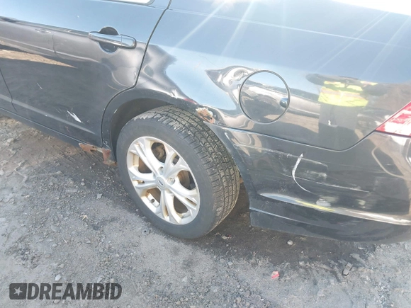 2012 Ford Fusion SE z VIN 3FAHP0HA8CR244002, wystawiony jako IAAI lot #41089721 z przebiegiem 239 745 mil mil oraz . Historia ofert i sprzedaży dostępna na DreamBid. Obrazek 6.