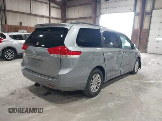 2013 Toyota Sienna XLE AAS with VIN 5TDYK3DC5DS363822, listed as a IAAI auction lot 42019598 with 74,508 mi miles. Bid and sale history available at carsss.com. Image 4.