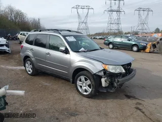 2009 Subaru Forester (Natl) X w/Premium Pkg with VIN JF2SH636X9H724184, listed as a IAAI auction lot 40858802 with 130,503 mi miles. Bid and sale history available at carsss.com. Image 1.