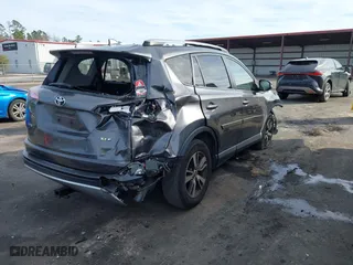 2018 Toyota RAV4 XLE with VIN JTMWFREV1JJ169926, listed as a IAAI auction lot 41464920 with 111,144 mi miles. Bid and sale history available at carsss.com. Image 4.