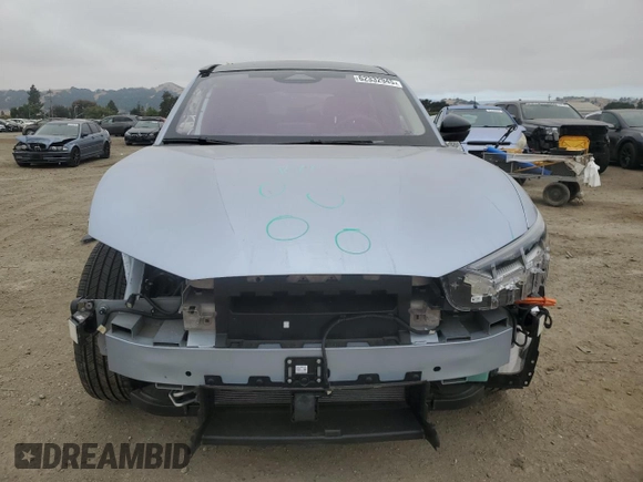 2022 Ford Mustang Mach-E Premium z VIN 3FMTK3SU8NMA43722, wystawiony jako Copart lot #62332945 z przebiegiem 13 559 mil mil oraz Szkoda całkowita • Salvage title. Historia ofert i sprzedaży dostępna na DreamBid. Obrazek 5.