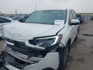 2019 Honda Pilot EX-L with VIN 5FNYF6H52KB025930, listed as a IAAI auction lot 42117673 with 84,721 mi miles and . Bid and sale history available at DreamBid. Image 17.