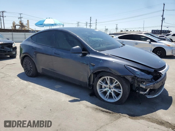 2024 Tesla Model Y Long Range with VIN 7SAYGDEE6RA226035, listed as a Copart auction lot 52539375 with 14,220 mi miles and Salvage title. Bid and sale history available at DreamBid. Image 4.
