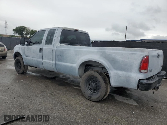 2000 Ford F-250 XL with VIN 1FTNX21F3YED35736, listed as a Copart auction lot 50309805 with 303,811 mi miles and Salvage title. Bid and sale history available at DreamBid. Image 2.
