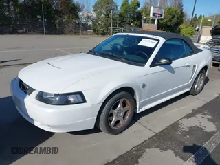 2004 Ford Mustang Deluxe with VIN 1FAFP44654F181293, listed as a IAAI auction lot 41831366 with 122,636 mi miles. Bid and sale history available at carsss.com. Image 6.