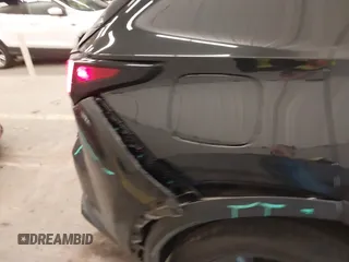 2022 Lexus NX 450h+ Luxury z VIN JTJHKCFZ7N2003572, wystawiony jako IAAI lot #42101154 z przebiegiem 34 455 mil mil oraz . Historia ofert i sprzedaży dostępna na DreamBid. Obrazek 17.