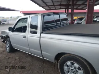 1999 Nissan Frontier XE z VIN 1N6DD26S3XC340419, wystawiony jako IAAI lot #40964630 z przebiegiem 156 431 mil mil oraz . Historia ofert i sprzedaży dostępna na DreamBid. Obrazek 14.