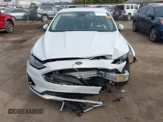 2020 Ford Fusion Hybrid SE with VIN 3FA6P0LU5LR195611, listed as a IAAI auction lot 41807998 with 128,439 mi miles. Bid and sale history available at carsss.com. Image 12.