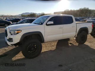 2017 Toyota Tacoma SR5 with VIN 3TMAZ5CNXHM032008, listed as a Copart auction lot 84200154 with 84,337 mi miles and Salvage Title. Bid and sale history available at carsss.com. Image 1.