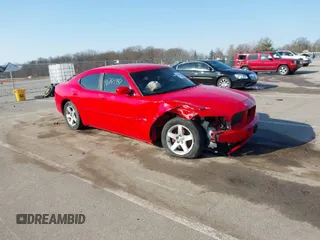 2010 Dodge Charger SXT with VIN 2B3CA3CV0AH197611, listed as a IAAI auction lot 41764997 with 211,670 mi miles and . Bid and sale history available at DreamBid. Image 1.