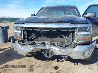 2016 Chevrolet Silverado 1500 LT with VIN 1GCVKREC3GZ121358, listed as a IAAI auction lot 41693996 with 103,811 mi miles and . Bid and sale history available at DreamBid. Image 6.