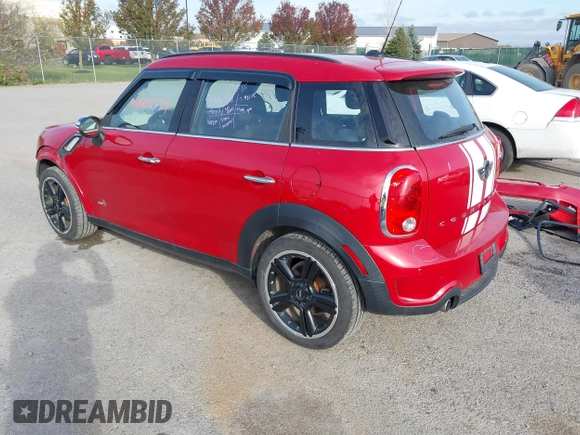 2015 MINI Cooper Countryman S with VIN WMWZC5C51FWP49282, listed as a IAAI auction lot 40698179 with 63,037 mi miles. Bid and sale history available at carsss.com. Image 3.