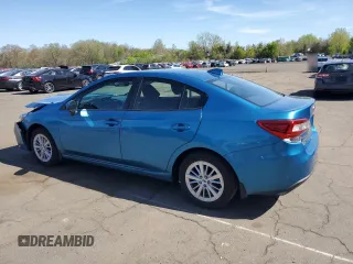 2018 Subaru Impreza Premium with VIN 4S3GKAD63J3605854, listed as a Copart auction lot 54986795 with 59,119 mi miles and Salvage title. Bid and sale history available at DreamBid. Image 2.