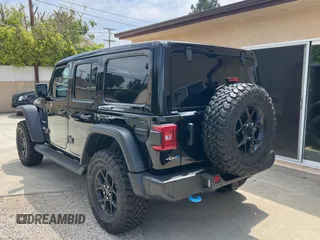 2023 Jeep Wrangler Sahara with VIN 1C4JJXP65PW627241, listed as a Copart auction lot 55661585 with 9,282 mi miles and Clean Title. Bid and sale history available at DreamBid. Image 3.
