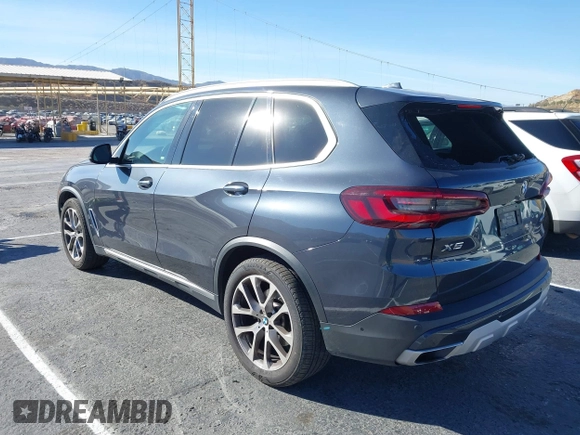 2021 BMW X5 sDrive40i with VIN 5UXCR4C00M9F94906, listed as a IAAI auction lot 41359872 with 37,161 mi miles. Bid and sale history available at carsss.com. Image 3.