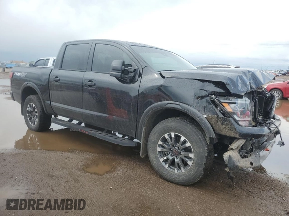 2024 Nissan Titan Pro-4X with VIN 1N6AA1ED7RN106896, listed as a Copart auction lot 55622215 with 16,155 mi miles and Salvage title. Bid and sale history available at DreamBid. Image 4.