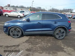 2017 Lincoln MKC Reserve z VIN 5LMTJ3DH0HUL70096, wystawiony jako IAAI lot #41621892 z przebiegiem 115 071 mil mil oraz . Historia ofert i sprzedaży dostępna na DreamBid. Obrazek 14.
