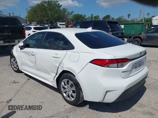 2023 Toyota Corolla LE with VIN 5YFB4MDE1PP058810, listed as a IAAI auction lot 42009318 with 10,950 mi miles and . Bid and sale history available at carsss.com. Image 3.