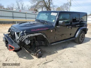 2016 Jeep Wrangler Unlimited Rubicon with VIN 1C4HJWFG4GL107777, listed as a Copart auction lot 48974135 with 118,164 mi miles and Salvage Title. Bid and sale history available at carsss.com. Image 1.