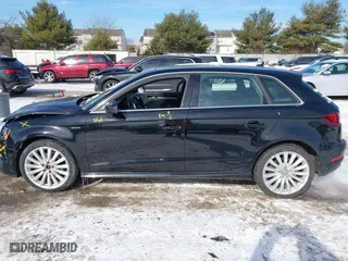 2016 Audi A3 e-tron Premium Plus with VIN WAUTPBFF8GA050534, listed as a IAAI auction lot 41378962 with 104,975 mi miles. Bid and sale history available at carsss.com. Image 14.
