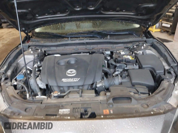 2015 Mazda 3 i Grand Touring z VIN JM1BM1M70F1222597, wystawiony jako IAAI lot #41960987 z przebiegiem 40 841 mil mil oraz . Historia ofert i sprzedaży dostępna na DreamBid. Obrazek 10.