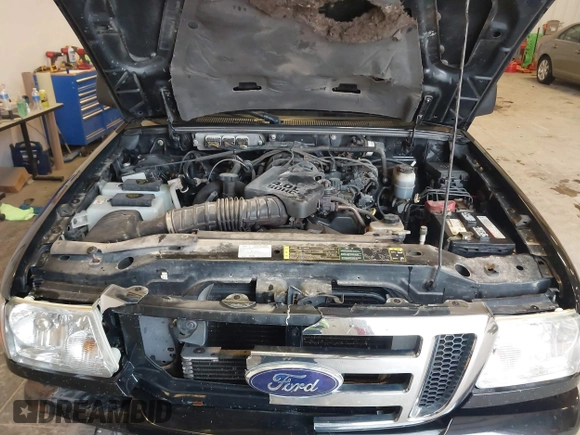 2009 Ford Ranger XLT with VIN 1FTZR45E79PA63934, listed as a IAAI auction lot 41441326 with 153,140 mi miles. Bid and sale history available at carsss.com. Image 10.