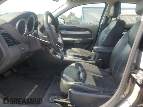 2010 Chrysler Sebring Limited with VIN 1C3CC5FB8AN117070, listed as a Copart auction lot 63481625 with 168,118 mi miles and Salvage title. Bid and sale history available at DreamBid. Image 7.