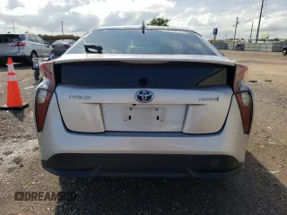 2016 Toyota Prius Four z VIN JTDKARFU0G3500883, wystawiony jako Copart lot #55211615 z przebiegiem 117 528 mil mil oraz Czysty tytuł • Clean title. Historia ofert i sprzedaży dostępna na DreamBid. Obrazek 6.
