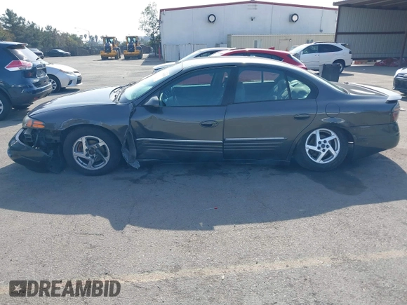 2003 Pontiac Bonneville SE z VIN 1G2HX52K934181238, wystawiony jako IAAI lot #41483636 z przebiegiem 176 737 mil mil oraz . Historia ofert i sprzedaży dostępna na DreamBid. Obrazek 6.