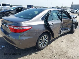 2015 Toyota Camry XLE with VIN 4T1BF1FK0FU952421, listed as a IAAI auction lot 41714622 with 125,553 mi miles and . Bid and sale history available at DreamBid. Image 4.