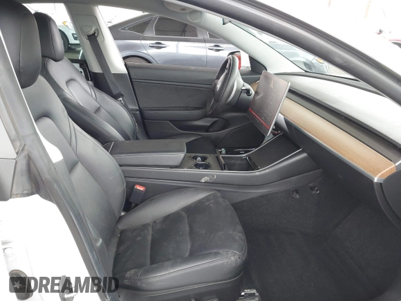 2020 Tesla Model 3 Long Range with VIN 5YJ3E1EB5LF801530, listed as a IAAI auction lot 41682050 with 65,743 mi miles. Bid and sale history available at carsss.com. Image 5.
