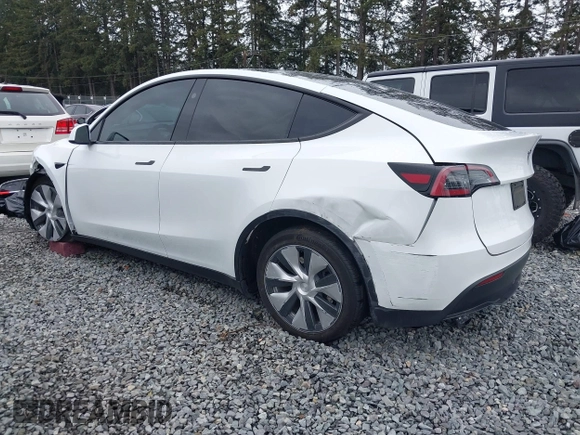 2023 Tesla Model Y Long Range with VIN 7SAYGDEE7PF809164, listed as a IAAI auction lot 41828974 with 31,772 mi miles. Bid and sale history available at carsss.com. Image 3.