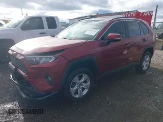 2020 Toyota RAV4 XLE with VIN 2T3W1RFV1LC052043, listed as a IAAI auction lot 42049165 with 116,628 mi miles and . Bid and sale history available at DreamBid. Image 2.