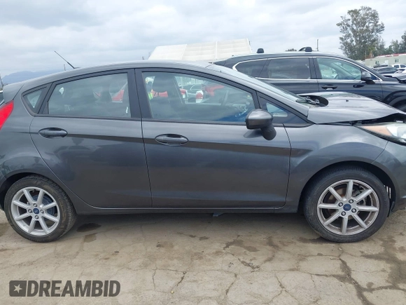 2018 Ford Fiesta SE with VIN 3FADP4EJ7JM127256, listed as a IAAI auction lot 41938121 with 83,211 mi miles. Bid and sale history available at carsss.com. Image 13.
