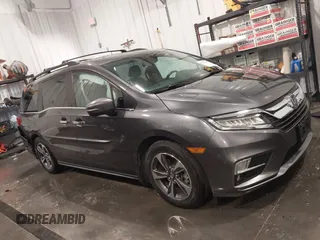 2018 Honda Odyssey Touring with VIN 5FNRL6H84JB041309, listed as a IAAI auction lot 42272247 with 90,371 mi miles and . Bid and sale history available at DreamBid. Image 13.