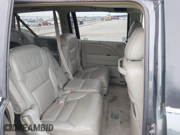 2005 Honda Odyssey EX-L with VIN 5FNRL38775B110232, listed as a IAAI auction lot 42301513 with 277,389 mi miles and . Bid and sale history available at DreamBid. Image 8.